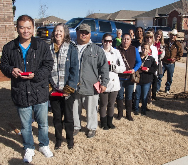 The 13 contestants line up to try their keys.