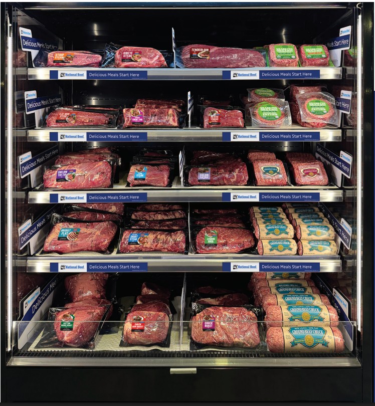 A fully merchandised SmartStock Solutions meat case stocked with National Beef Retail Ready steaks, roasts and ground beef