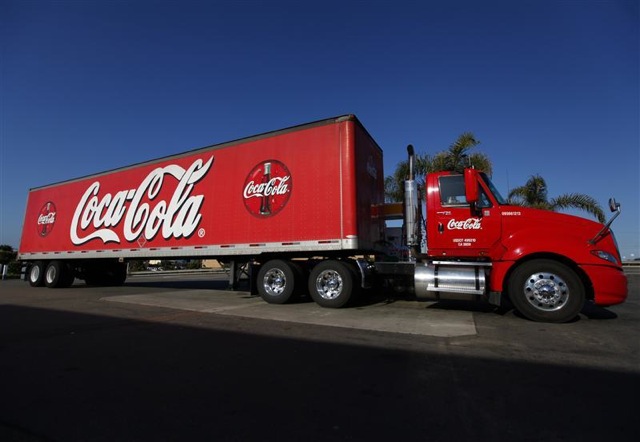 A Coca-Cola truck fills up with diesel fuel at a gas station in Carlsbad California