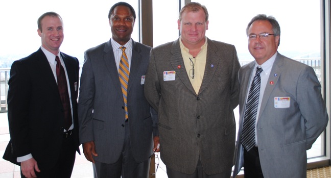 Cooper Stephenson and Curtis Lyons with Flowers Baking Company, Steve Mulford with Royal Foods and Harold Garrett with Gateway Foods