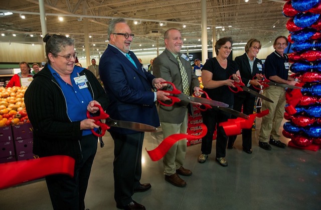 The ceremonial ribbon is cut in celebration of the opening of Meijer's Manistee, Michigan, supercenter.