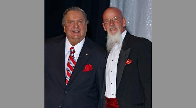 Jack H. Brown, chairman and CEO of Stater Bros. Markets, with 50-year honoree Mark Gregor at the grocer's annual Service Awards Banquet. Gregor is a truck driver in the company's transportation department.