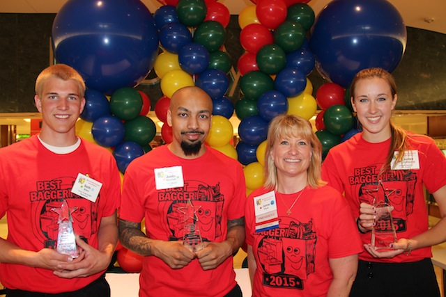 Seth Allen, Chris’ Food Center, Sandstone, third place; Justin Marshall, Kowalski’s Market, Minneapolis, second place; Jamie Pfuhl, MGA President; and winner Lauren Gillson, Lunds & Byerlys, St. Cloud.