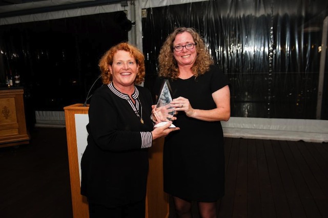 U.S. Sen. Heidi Heitkamp accepts the WGA Legislator of the Year Award from Kristi Magnuson-Nelson, president of Hugo's Supermarkets, based in Grand Forks, North Dakota.