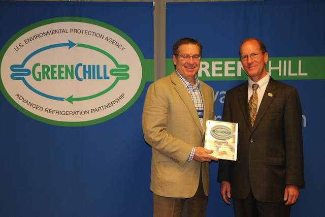 Scott Martin of Hillphoenix receives a Store Certification Excellence Award from Tom Land of the EPA GreenChill Program. 