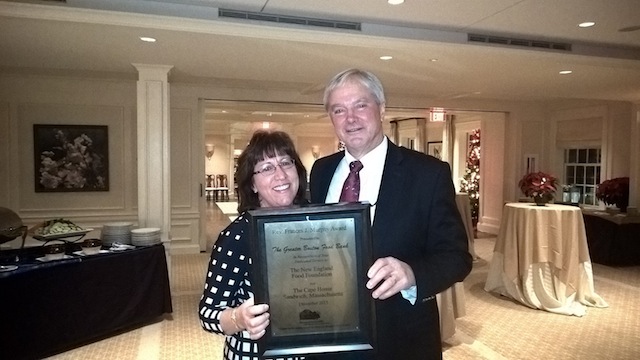 Cheryl Shondek of the Greater Boston Food Bank accepts the New England Food Foundation (NEFF) Father Murphy Award from Jerry Larsson of JOH and the NEFF.