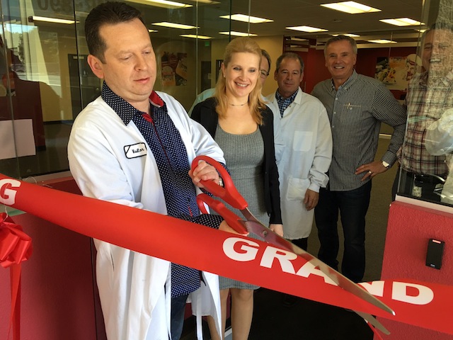 Popkoff's President Alex Meseonznik cuts the ribbon alongside the company's executive team during Popkoff’s grand opening ceremony in City of Industry, California. (Photo courtesy of Popkoff’s)