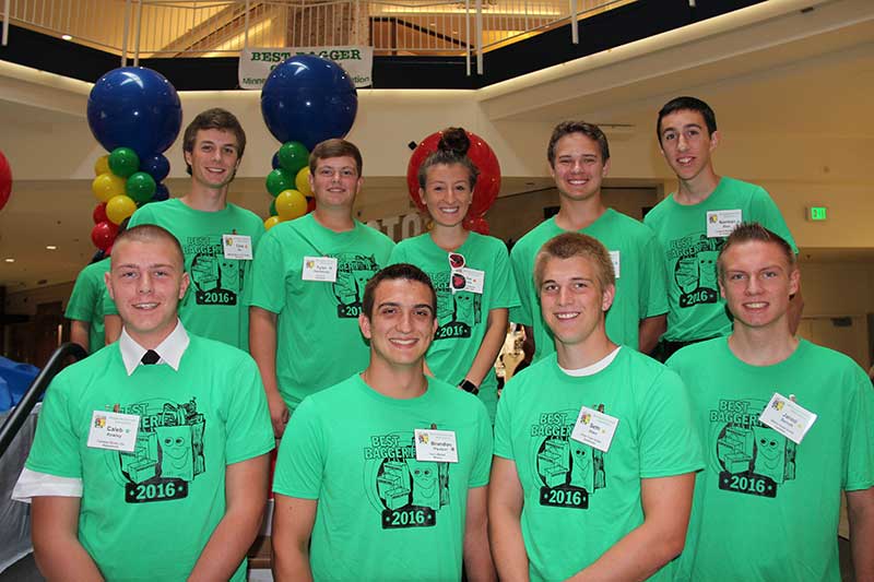 Seth Allen of Chris’ Food Center in Sandstone, Minnesota, front row second from right, is Minnesota's best grocery bagger. He is pictured with the competition's other finalists.