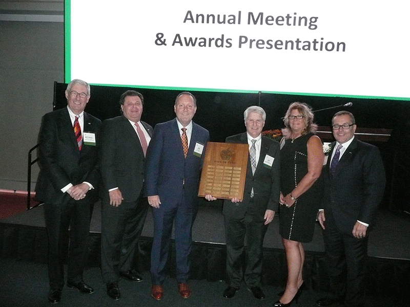 On hand for a group photo just prior to MFA's annual meeting were award winners Michael Sleeper, Imperial Distributors; Michael Bozzuto, Bozzoto's; new MFA Chairman Joe Kelley, Star Market; outgoing Chairman Jay Rainville, Market Basket; and Gayle Baker of C&S and Al Letizio Jr. of A.J. Letizio Sales & Marketing, both representing the New England Food Foundation.