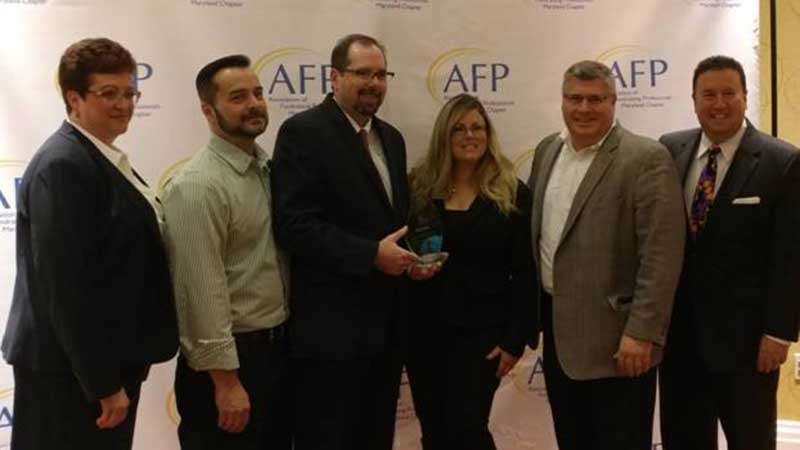 Tamara Zavislan, president, Association of Fundraising Professionals—Maryland Chapter; Elmer Dalton, store manager, Dundalk, Maryland's Towns Center Shopping Center Giant; Jamie Miller, manager, public and community relations, Giant Food; Jennifer Gonzalez, event specialist, Giant Food; Thomas Cormier, director of government affairs, Ahold USA; and Jamie Costello, news anchor, WMAR-TV.