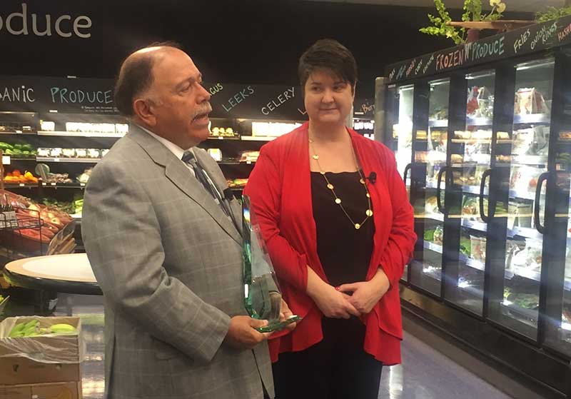 Don Caster, founder and owner of Raisin Rack Natural Food Market, and Kristin Mullins, president and CEO of the Ohio Grocers Association.