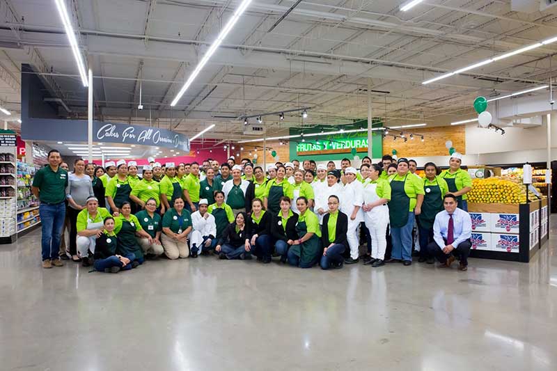 The crew of the new El Rio Grande Latin Market in Mesquite poses for a picture before the store opens.