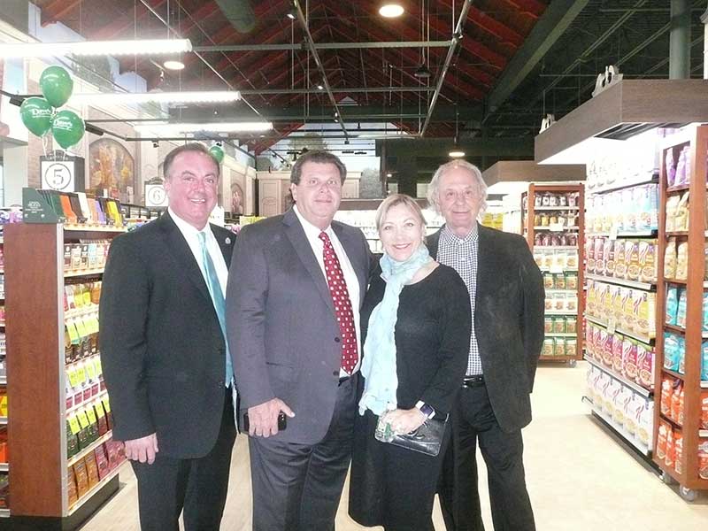 Steve Heggelke and Michael Bozzuto of Bozzuto's congratulate Leeann and Dave Cesario of Dave's Marketplace on the company's 10th store in Cranston, Rhode Island.