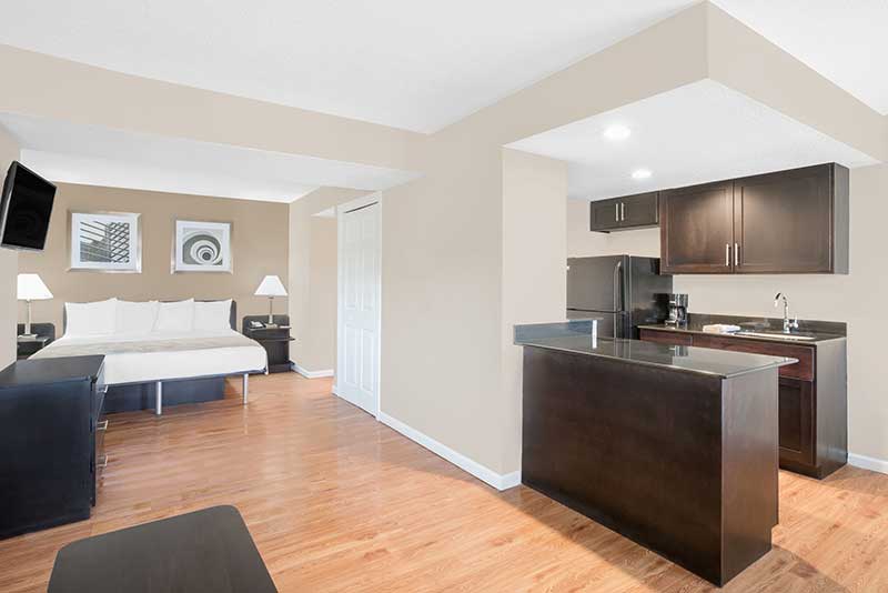 A Hawthorn Suites by Wyndham guest room now features a fully-equipped kitchen.