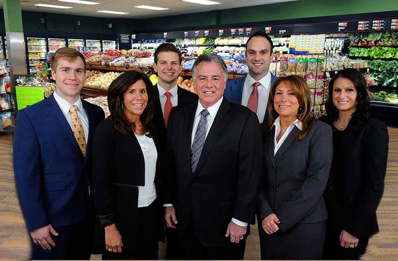 Family members and staff of Inserra Supermarkets recently gathered to announce the launch of the locally grown produce program.