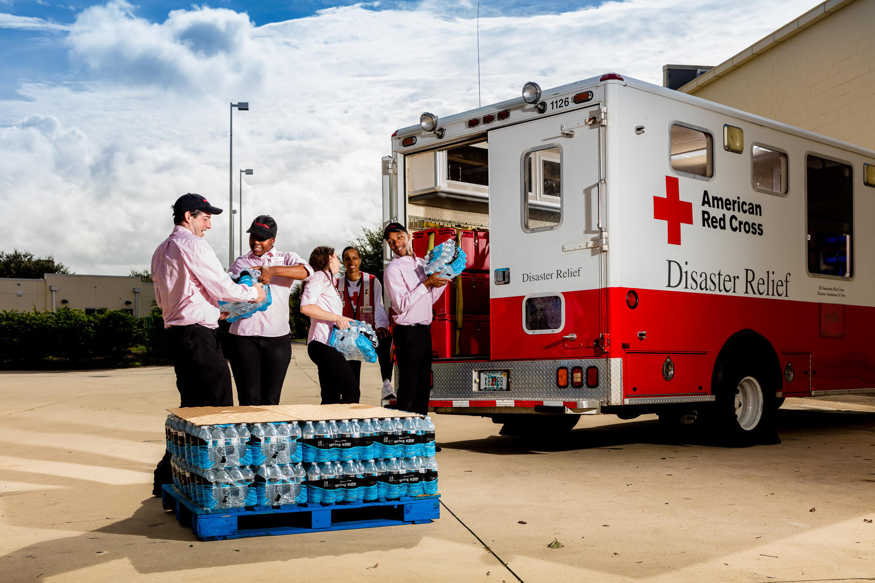 SEG volunteers unloading water for Harvey relief efforts.