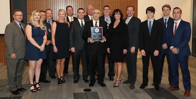 Dr. Terry Maness, Dean, Baylor School of Business; Tatum Lowe, Alan Buxkemper, Tim Cotton, Julie Lowe, Shawn Pickrell, VP and CEO Roger Lowe Jr., Randy Arceneaux, President Roger Lowe Sr., Joel Griffith, VP and General Counsel Lezlie Lowe, David Atkison, Keaton Harlan, Reece Atkinson and Cade Tumlinson.