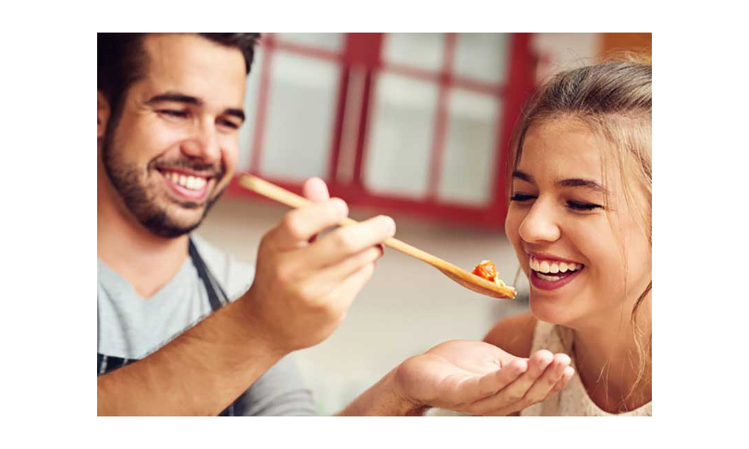 A couple preparing dinner