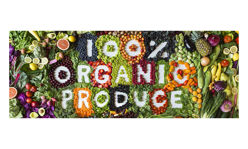 A Natural Grocers banner made from produce