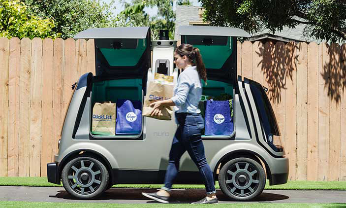 Nuro's driverless delivery vehicle being unloaded