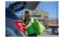 An Instacart shopper loading a car in a Kroger parking lot.