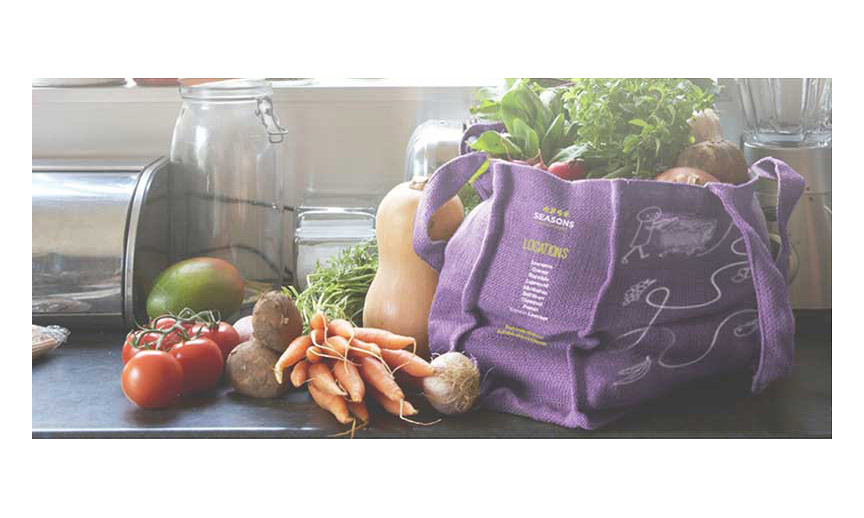 A bag of Season Kosher groceries on a counter.