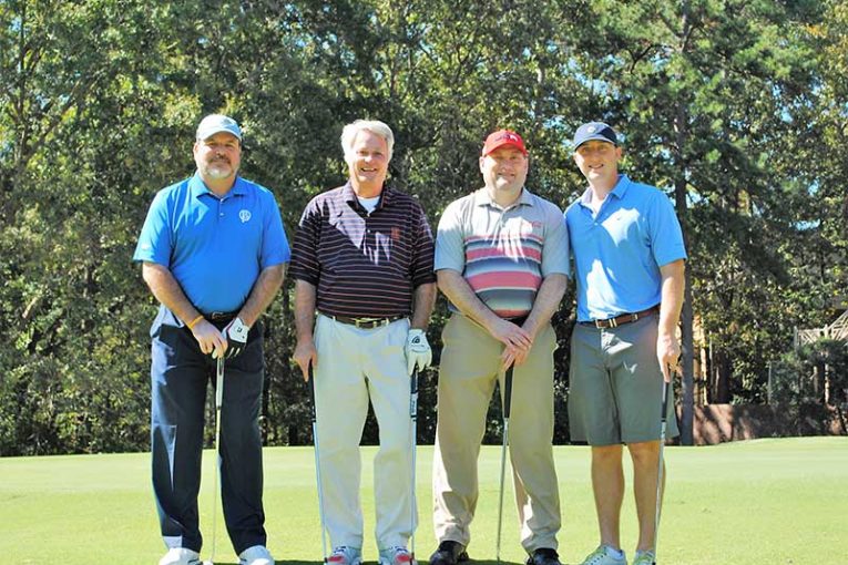 First Place Team: Bill Davis, Ken Herron, Robert Burnett and Ben Parr, A&R Super Markets.