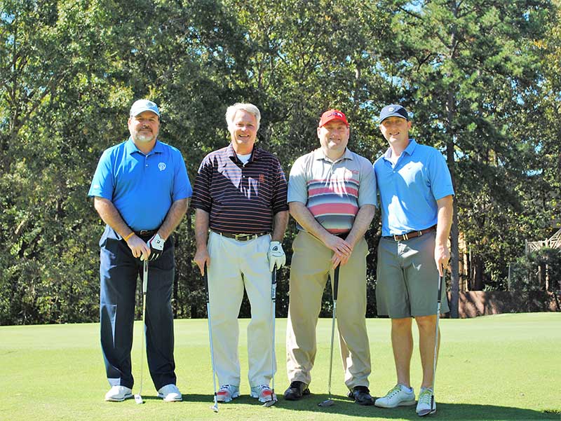 First Place Team: Bill Davis, Ken Herron, Robert Burnett and Ben Parr, A&R Super Markets.