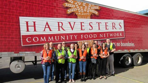 Hormel and AWG donate hams to Harvesters.