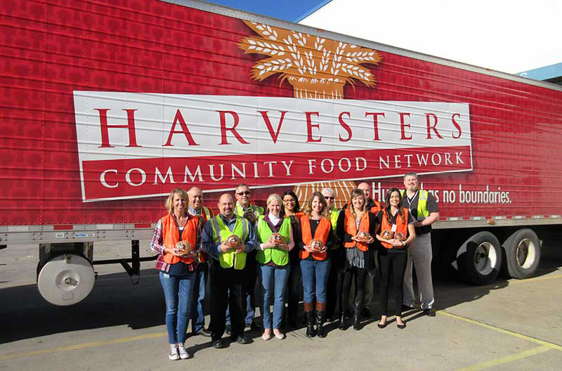 Hormel and AWG donate hams to Harvesters.