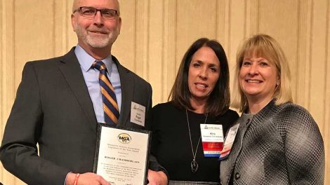 Sen. Roger Chamberlain, MGA Board Chairman Kris Kowalski Christiansen and MGA President Jamie Pfuhl.