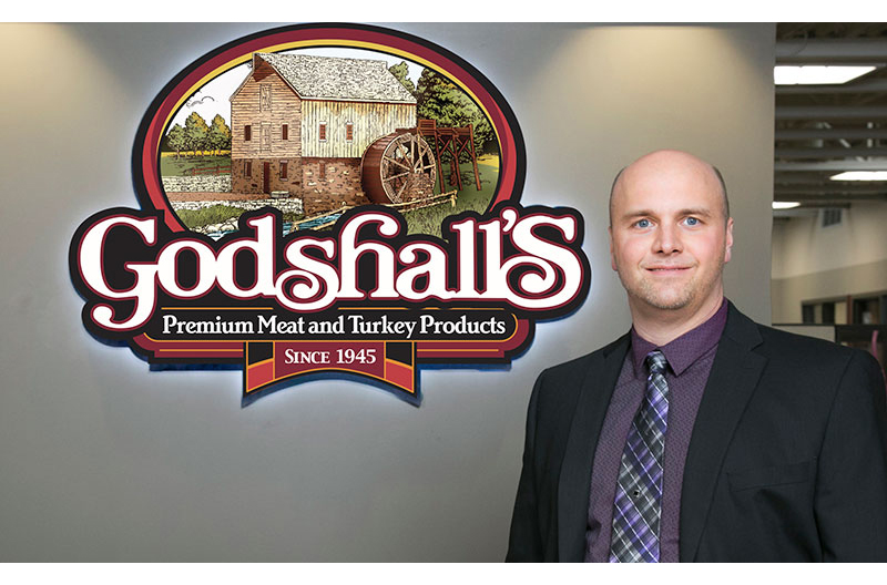 Ron Godshall with logo