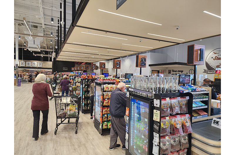 Super King Markets customer at checkout