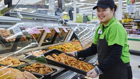 Festival Foods employee serving fresh food at store