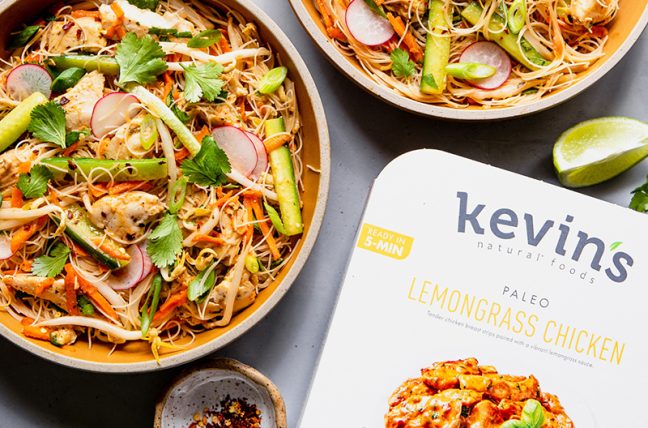 Kevin's Natural Foods box surrounded by dishes of food