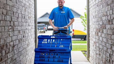 Walmart delivery driver dropping off purchases