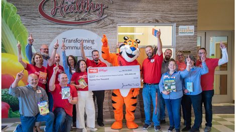 Weis and Kellogg at the check presentation