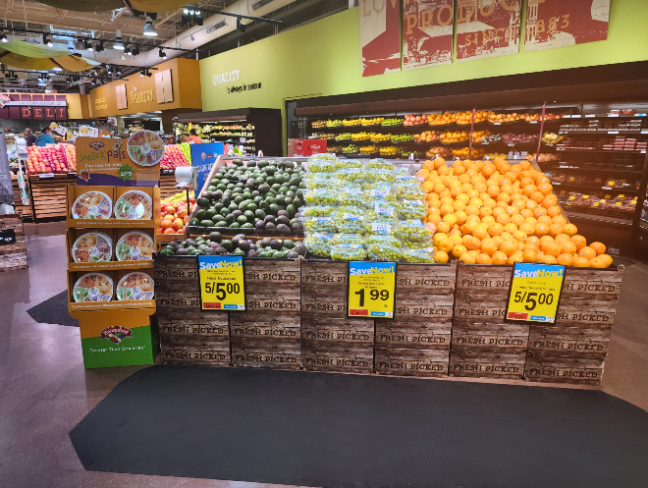 Hannaford produce section with the Snack Pals plates beside it