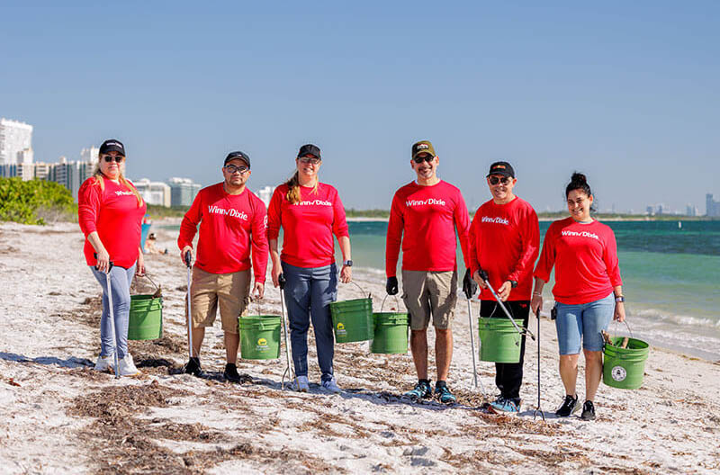 SEG Winn-Dixie employees cleaning up beach to celebrate Earth Month