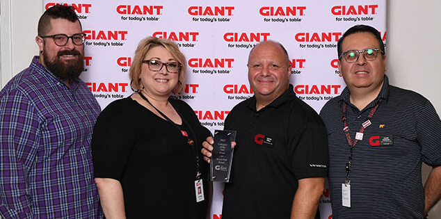 Kevin Prill and his team member at The Giant Company annual meeting