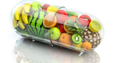 Image of fruits and vegetables inside a clear capsule for food as medicine