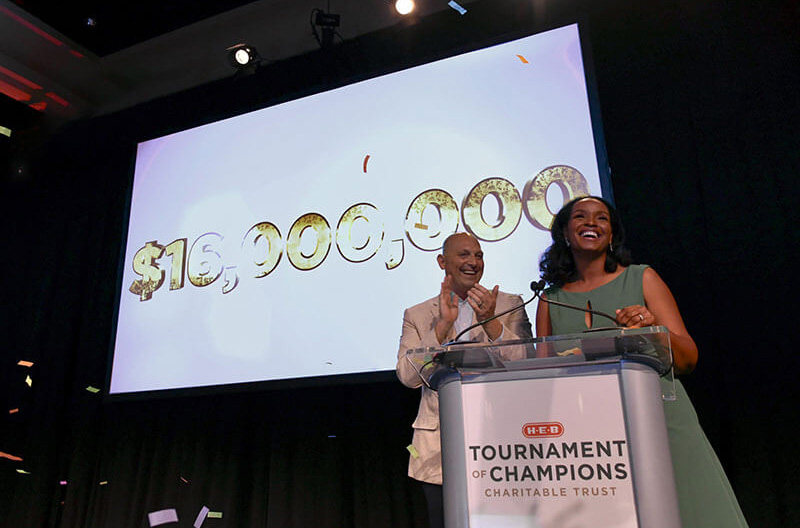 Photo of fundraising total on screen at H-E-B Tournament of Champions event