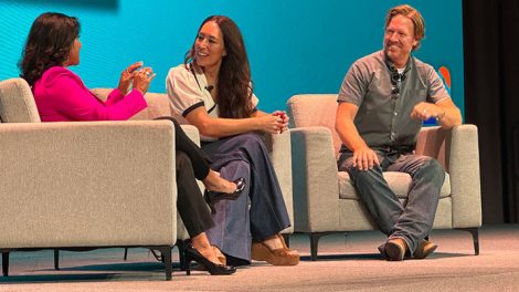 Photo of Eva Saha talking with Joanna and Chip Gaines onstage at the 2024 IDDBA Show