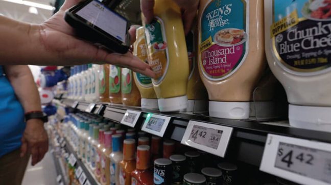 Image of salad dressing bottles with digital shelf labels at Walmart