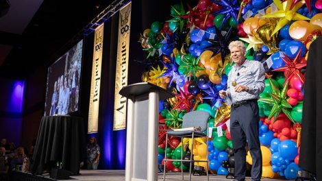 David Ball on stage at anniversary celebration