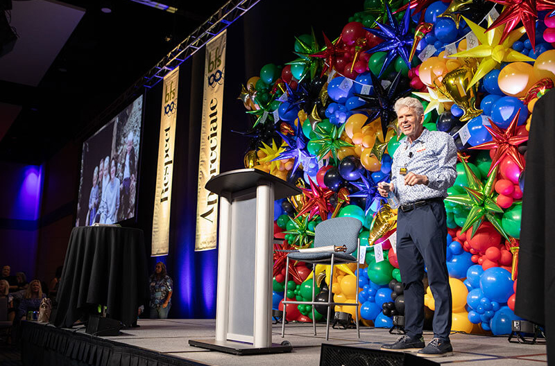 David Ball on stage at anniversary celebration