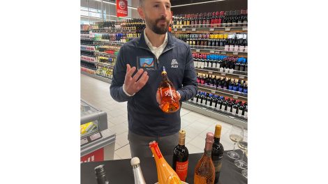 image of Arlin Zajmi in Aldi wine aisle