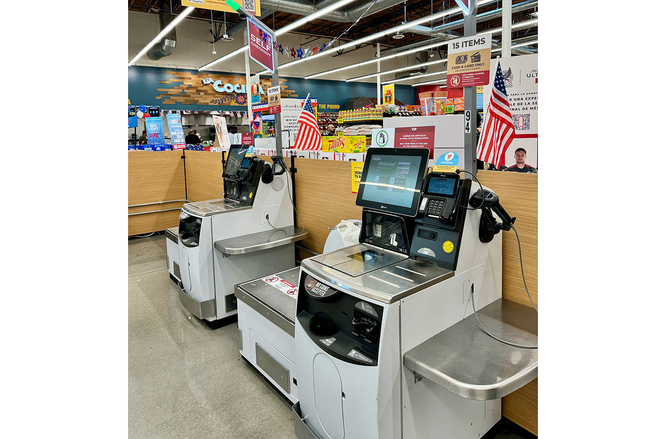 image of self-checkout lane at grocery store