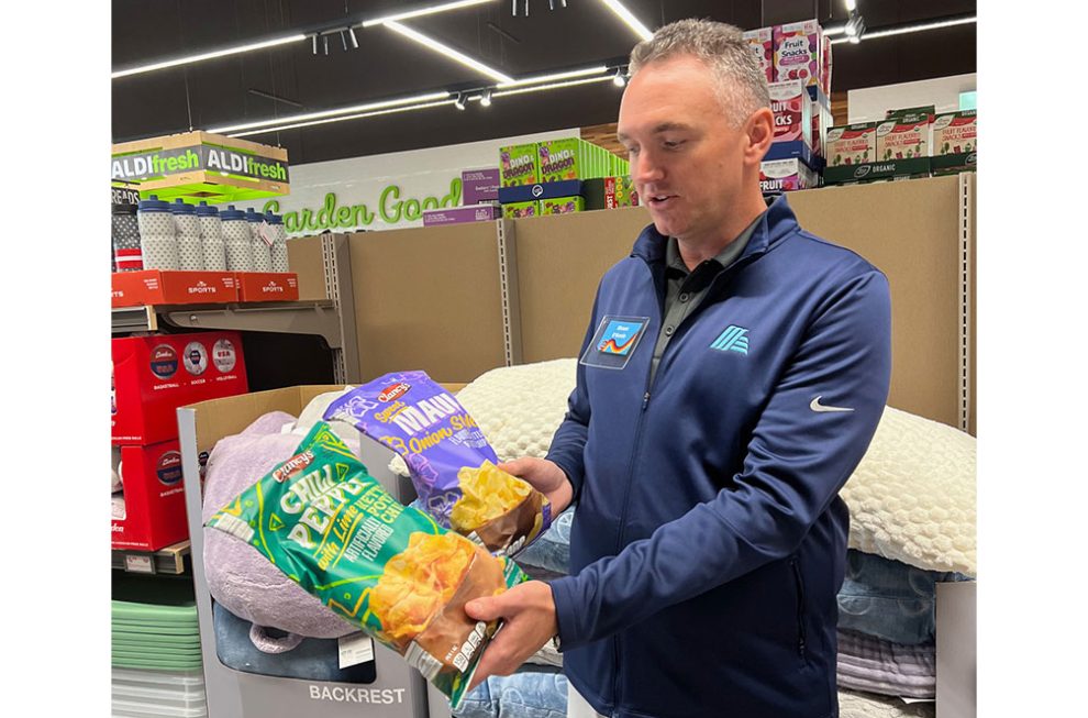 image of Aldi VP Shaun O'Keefe in Aldi Finds aisle