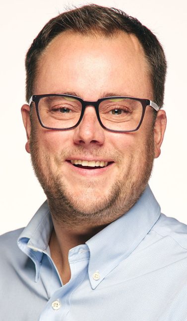 headshot of Midtown Market owner Andy Carloss